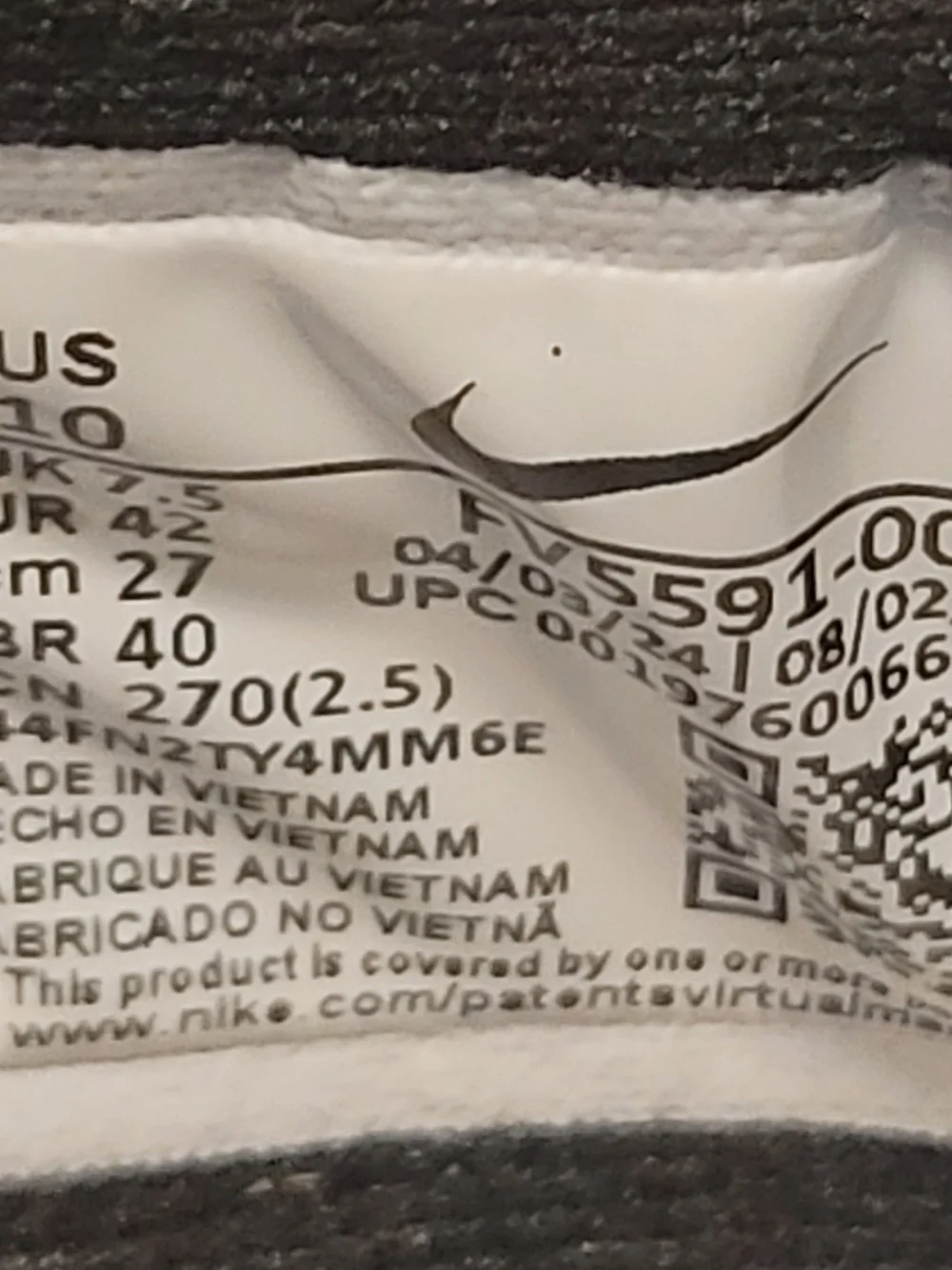 Nike Black and White Slip-On Running Shoes